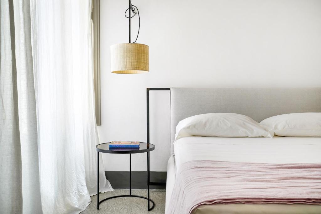 Postel nebo postele na pokoji v ubytování Palazzo De Noha - Boutique Hotel