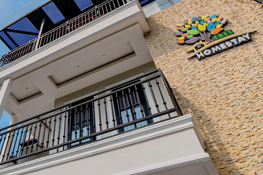 Certificato, attestato, insegna o altro documento esposto da Tree Homestay Mitra RedDoorz