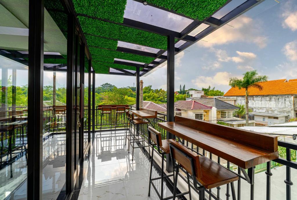 Balcone o terrazza di Tree Homestay Mitra RedDoorz