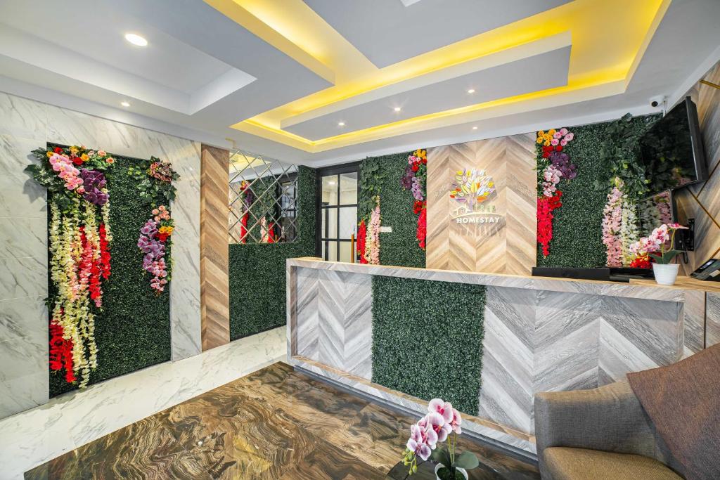 Area soggiorno di Tree Homestay Mitra RedDoorz