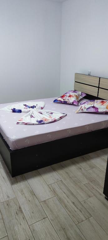 Postel nebo postele na pokoji v ubytování Vila Axel