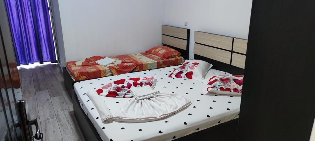Postel nebo postele na pokoji v ubytování Vila Axel