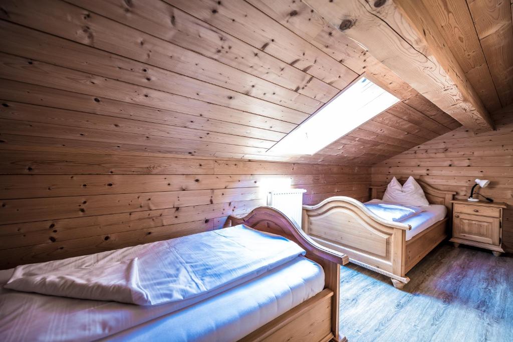 Postel nebo postele na pokoji v ubytování Obermayrgut