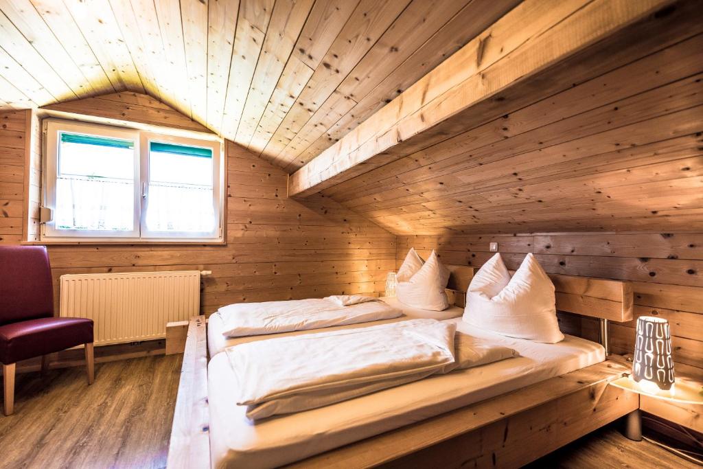 Postel nebo postele na pokoji v ubytování Obermayrgut