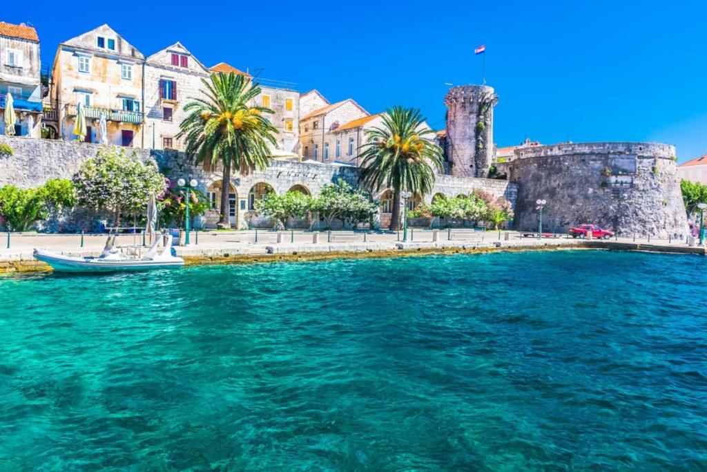 een uitzicht op het water voor een stad bij A1 - luxury apt in center just 5min from beach in Korčula