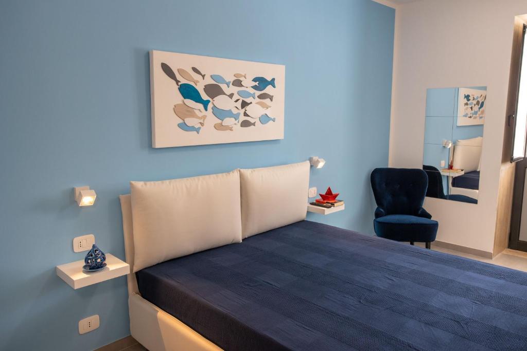 Postel nebo postele na pokoji v ubytování Villa Altomare