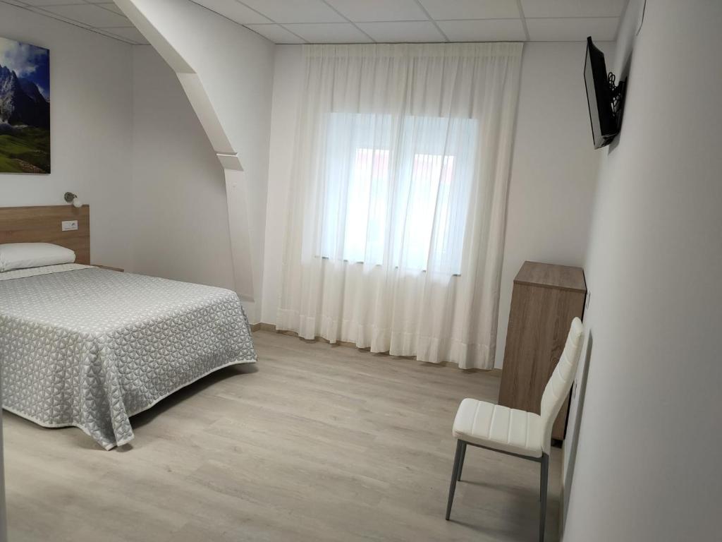 Postel nebo postele na pokoji v ubytování Las Huertas
