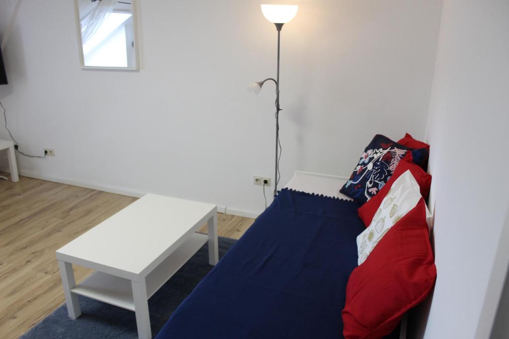 Postel nebo postele na pokoji v ubytování Pension Waldhof am Stubenbergsee