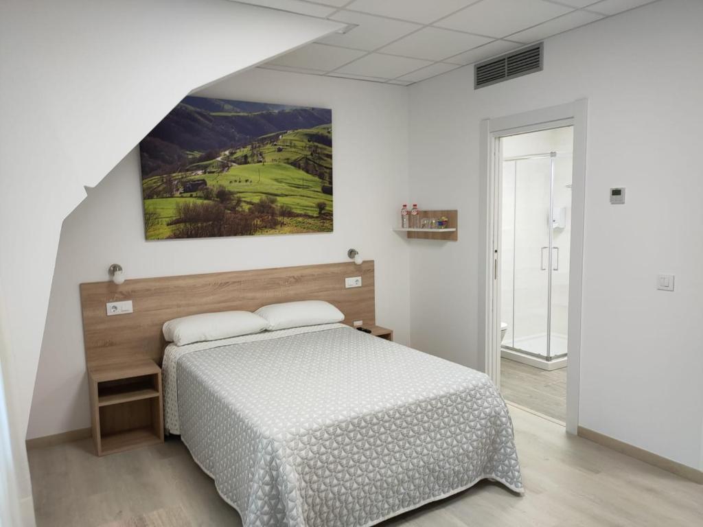 Postel nebo postele na pokoji v ubytování Las Huertas