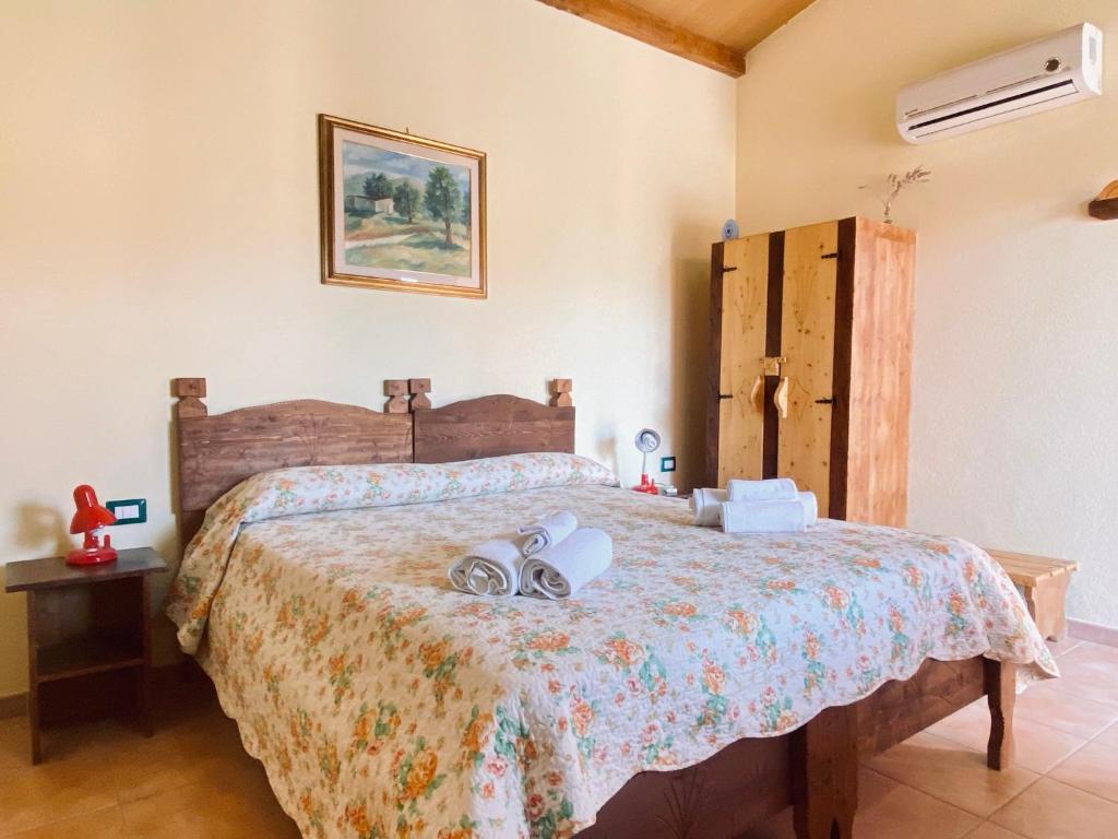 Cama o camas de una habitación en Le Ginestre Alghero