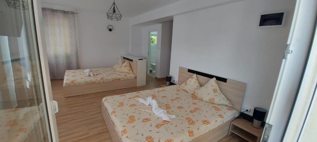 Postel nebo postele na pokoji v ubytování Casa Francisc