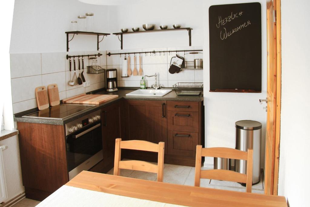 Eldhús eða eldhúskrókur á 3 Seiten Ferienwohnung