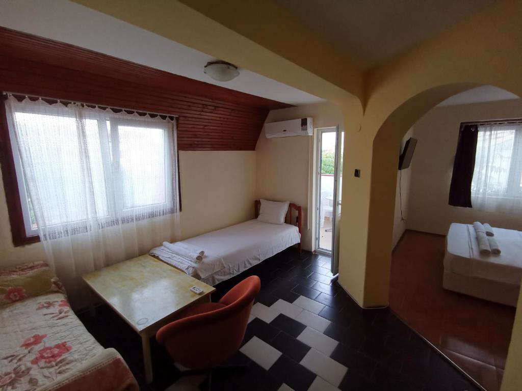Postel nebo postele na pokoji v ubytování Hotel VALDI