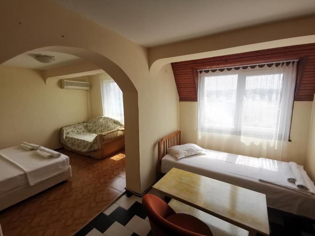 Postel nebo postele na pokoji v ubytování Hotel VALDI