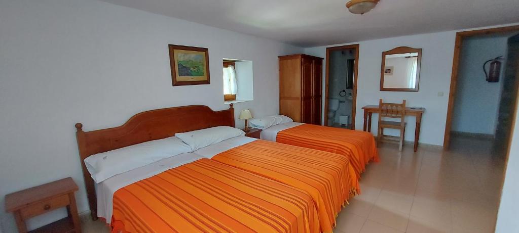Postel nebo postele na pokoji v ubytování Casa Lisa