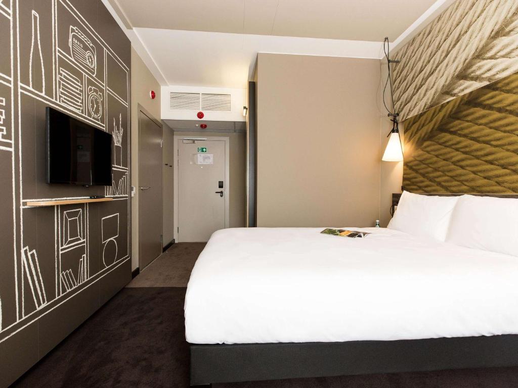 Postel nebo postele na pokoji v ubytování ibis Vilnius Centre