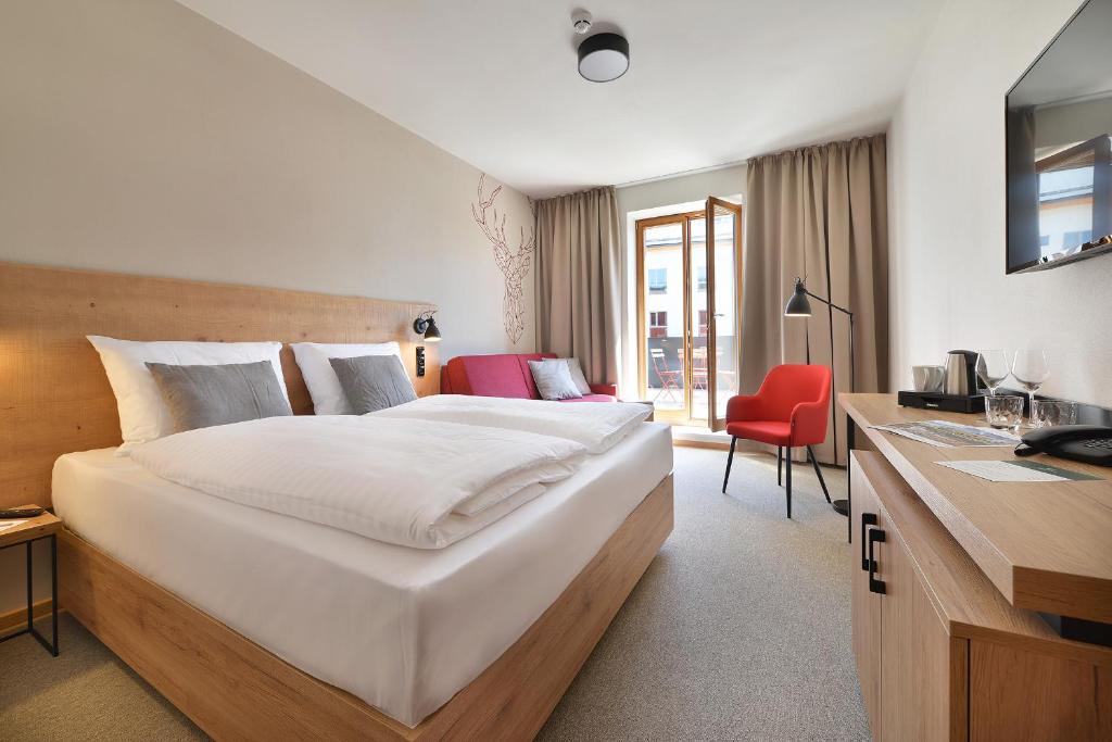 Postel nebo postele na pokoji v ubytování Hotel Element