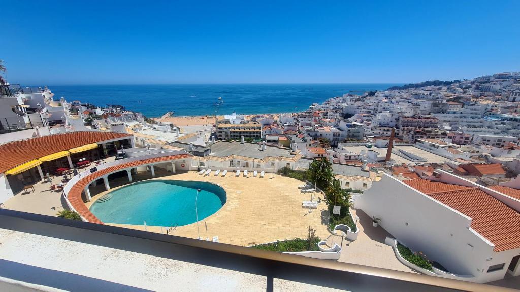 a view of a city with a swimming pool at Albufeira, Sea View (25) in Albufeira