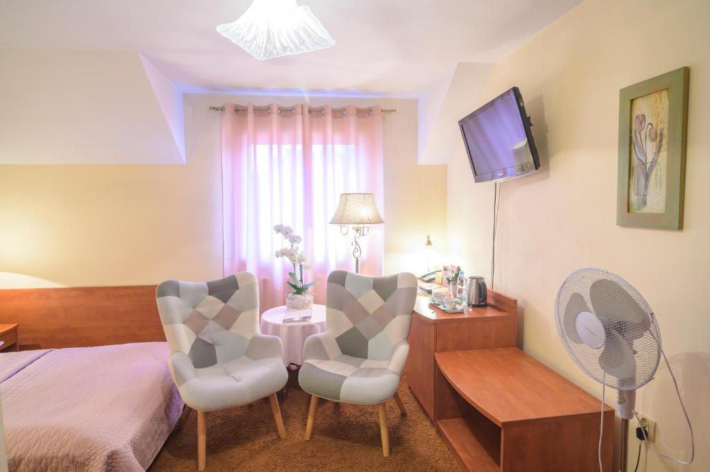 Postel nebo postele na pokoji v ubytování Centrum Ulan Spa