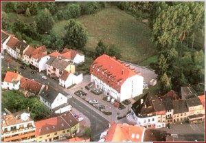 an aerial view of a town with a parking lot at Eppelborner Hof in Eppelborn