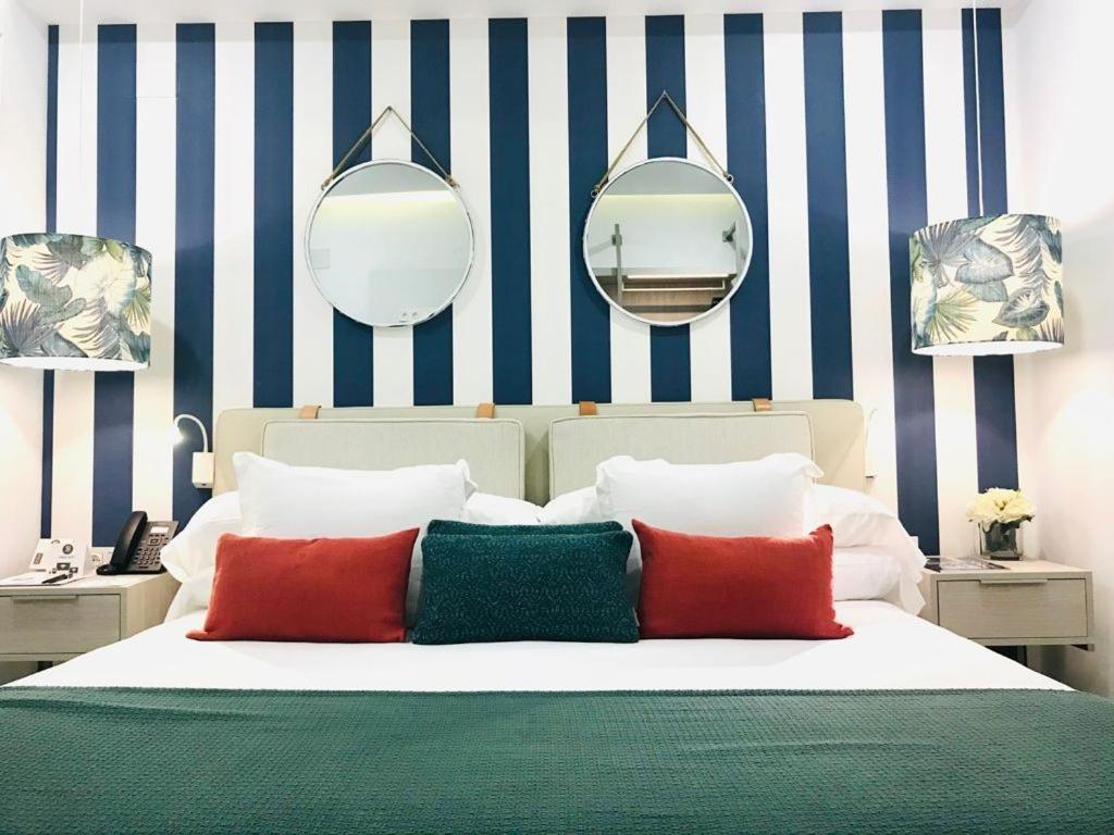 Posteľ alebo postele v izbe v ubytovaní Soho Boutique Urban