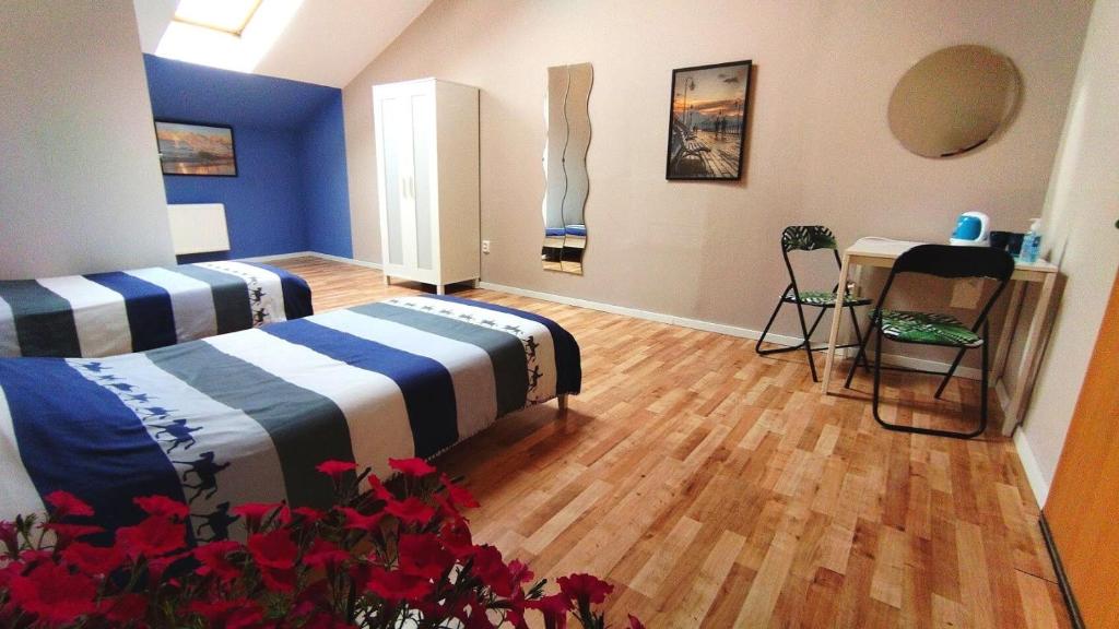 Postel nebo postele na pokoji v ubytování Smart Stay Hostel Gdynia