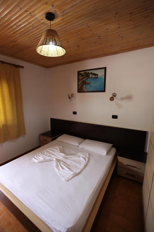 Postel nebo postele na pokoji v ubytování Hotel Colosseo