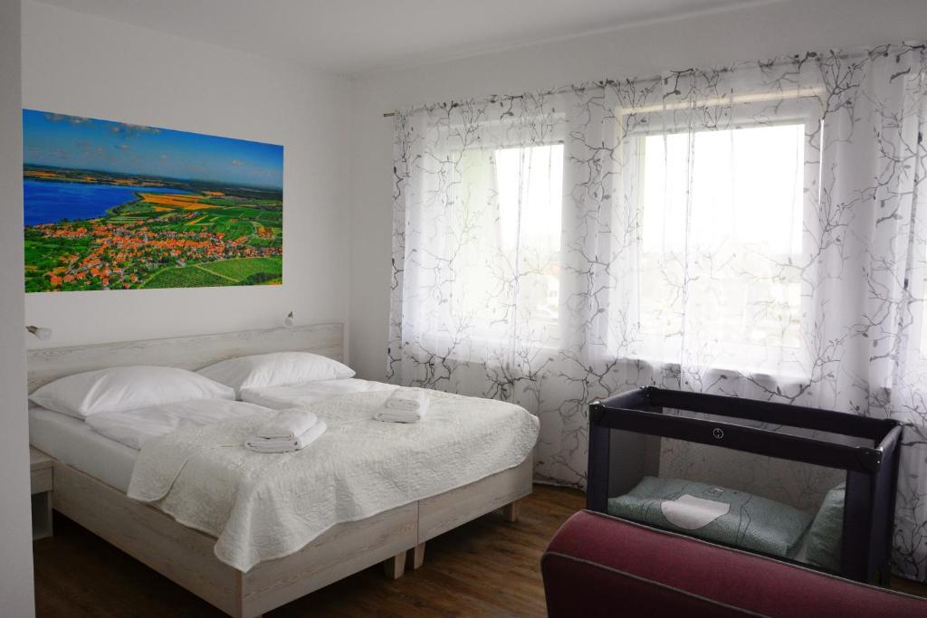 Katil atau katil-katil dalam bilik di Apartmány Pemag Mikulov