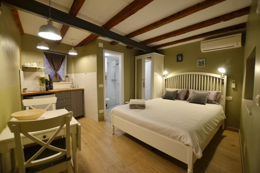 Ένα ή περισσότερα κρεβάτια σε δωμάτιο στο Suite Lisa