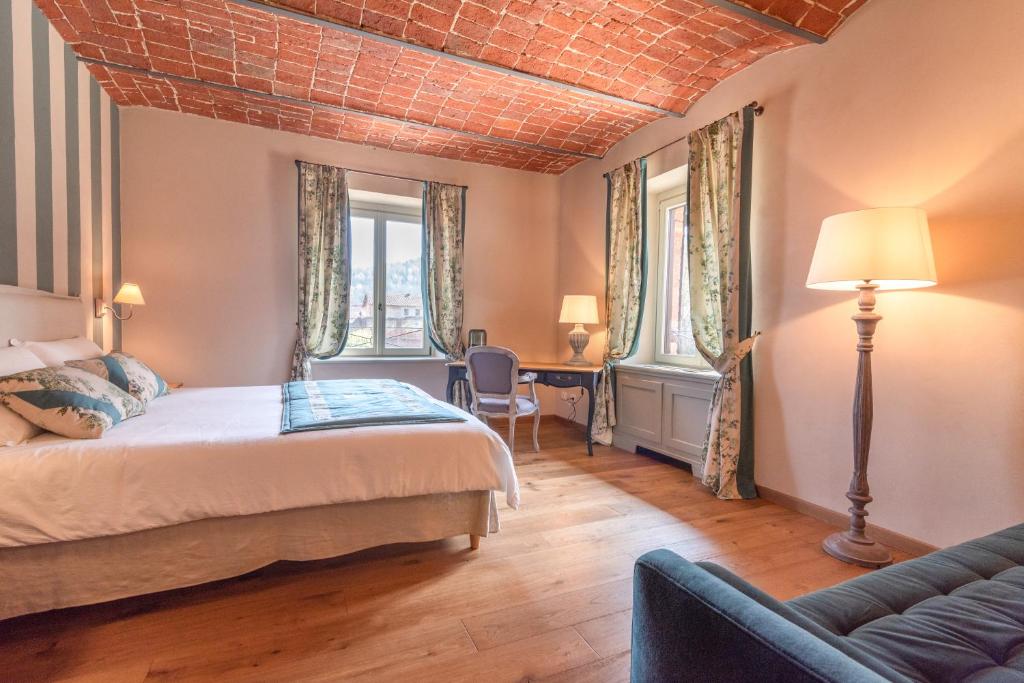 Posteľ alebo postele v izbe v ubytovaní Marchesi Incisa Winery Lodge