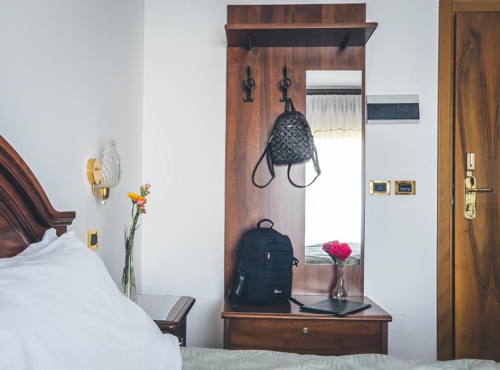 Postel nebo postele na pokoji v ubytování Hotel Da Gigi