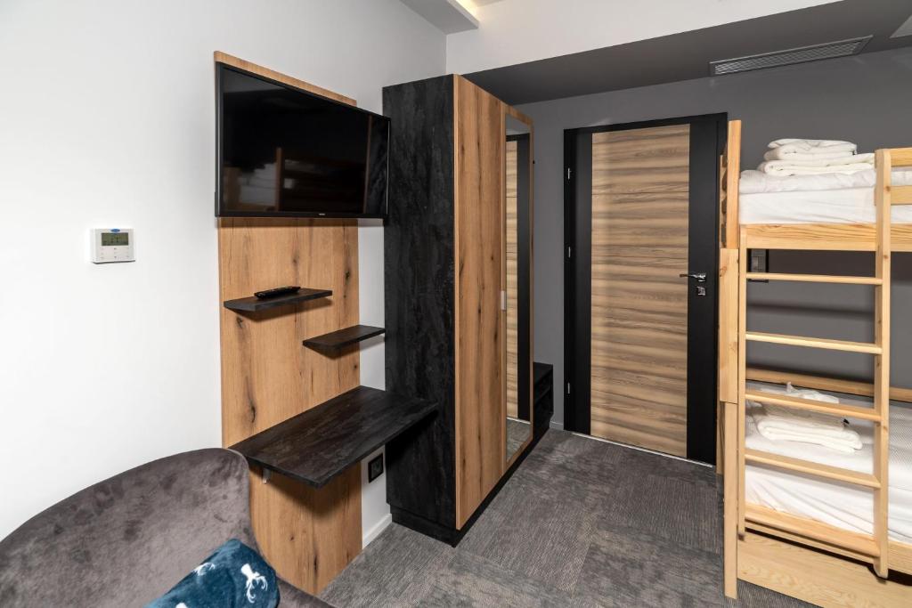 TV a/nebo společenská místnost v ubytování Arany Apartman Miskolc