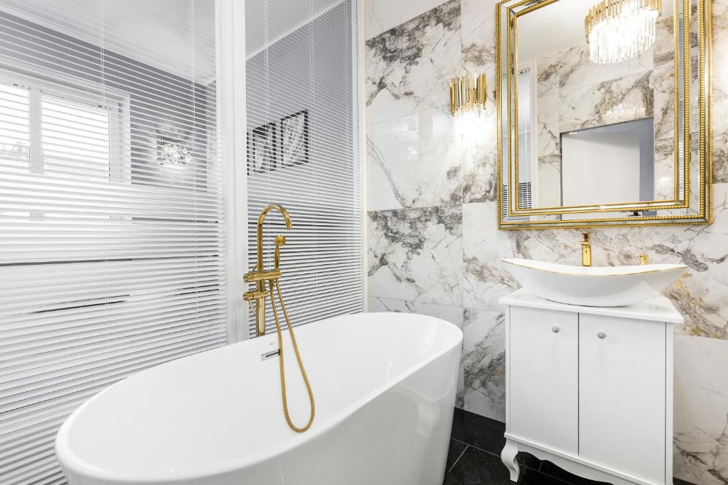 Kúpeľňa v ubytovaní Apartamenty Świętojańskie Gdynia