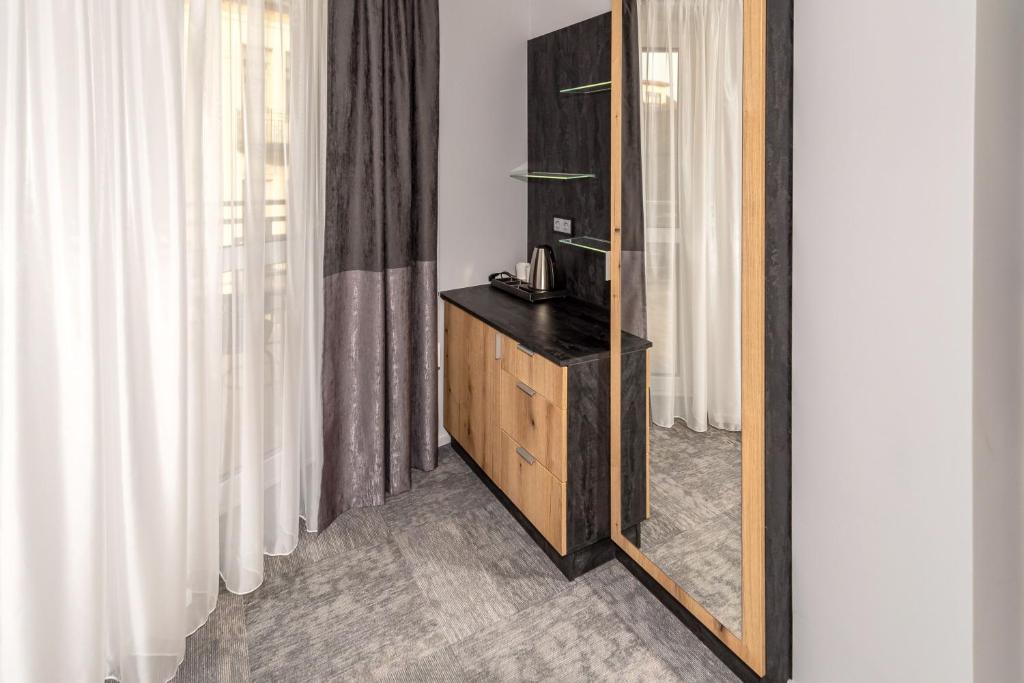 Kuchyň nebo kuchyňský kout v ubytování Arany Apartman Miskolc