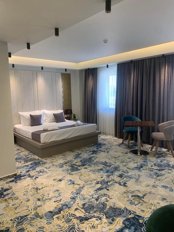 Postel nebo postele na pokoji v ubytování Apartments Jordan Luxury - Gevgelija