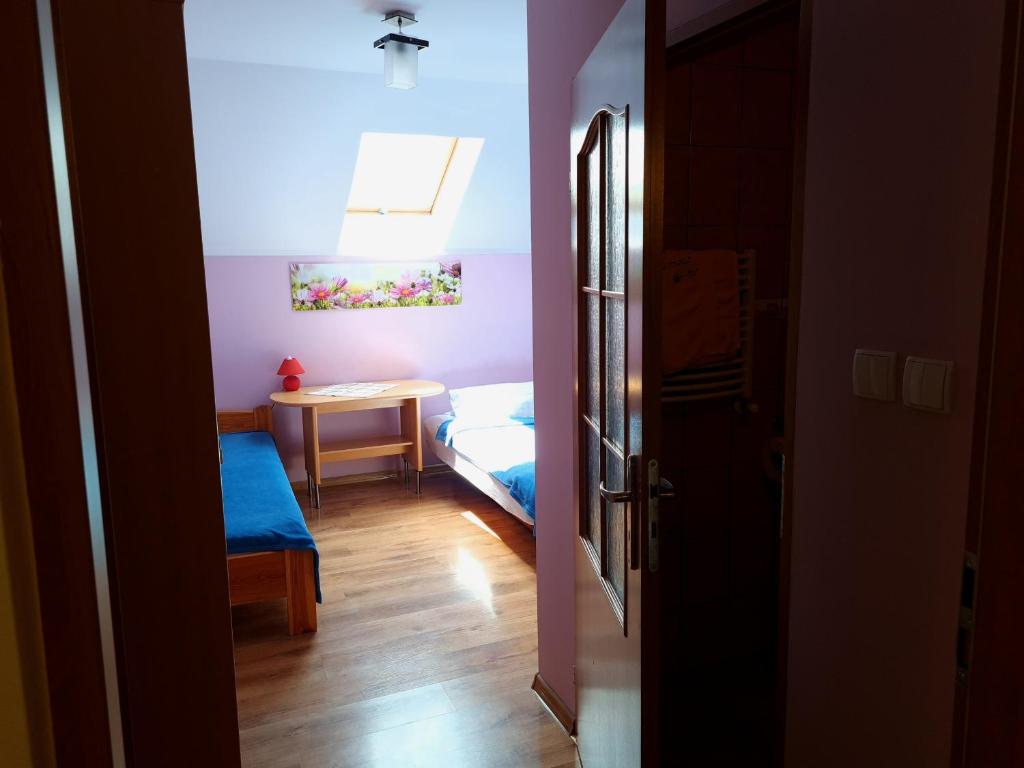 Postel nebo postele na pokoji v ubytování Stara Mleczarnia