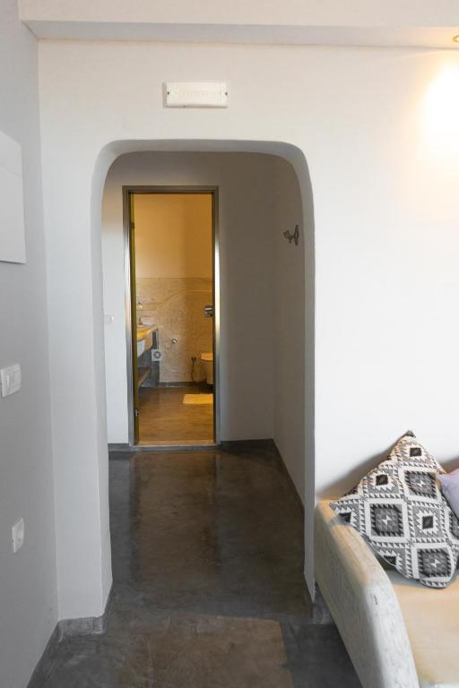Postel nebo postele na pokoji v ubytování Demilmar Luxury Suites