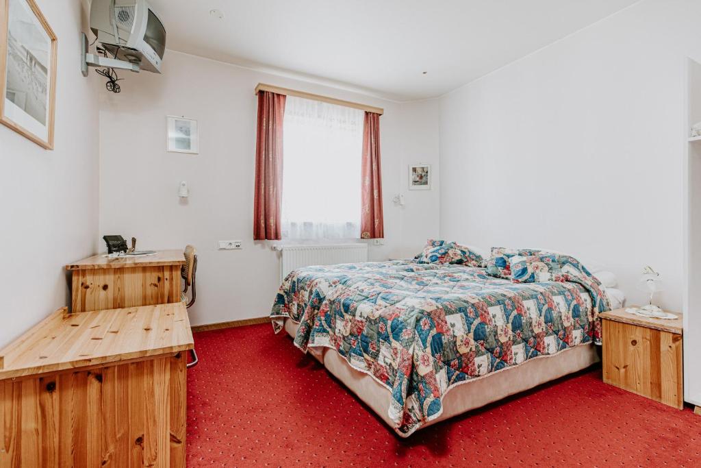 Postel nebo postele na pokoji v ubytování Narfastadir Guesthouse