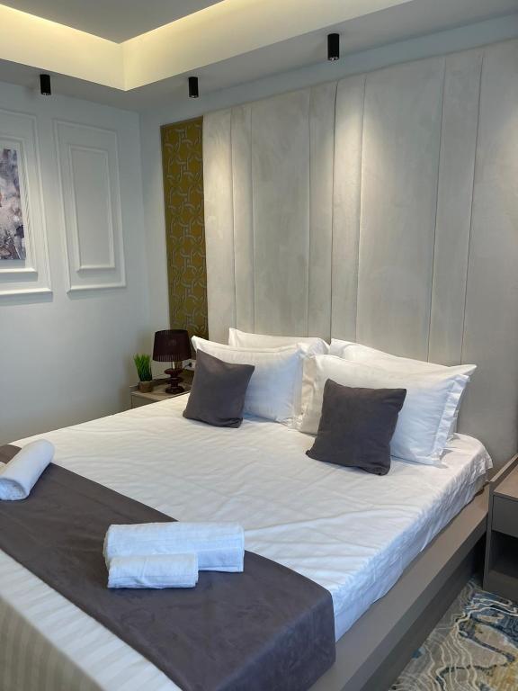 Postel nebo postele na pokoji v ubytování Apartments Jordan Luxury - Gevgelija