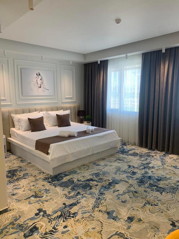 Postel nebo postele na pokoji v ubytování Apartments Jordan Luxury - Gevgelija