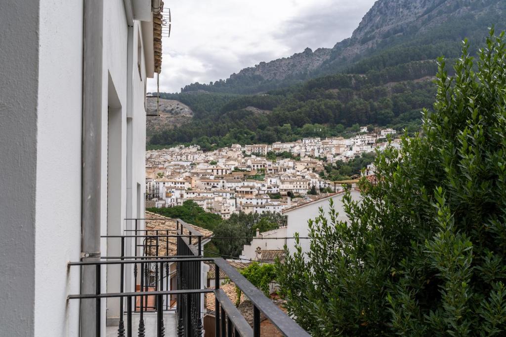 a view of a town from a balcony of a building at Mirador de San Isicio in Cazorla