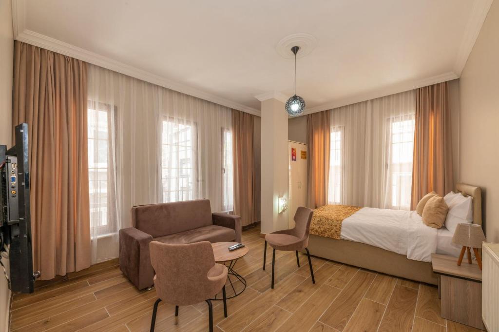 Postel nebo postele na pokoji v ubytování Marida Residence - Istanbul Taksim