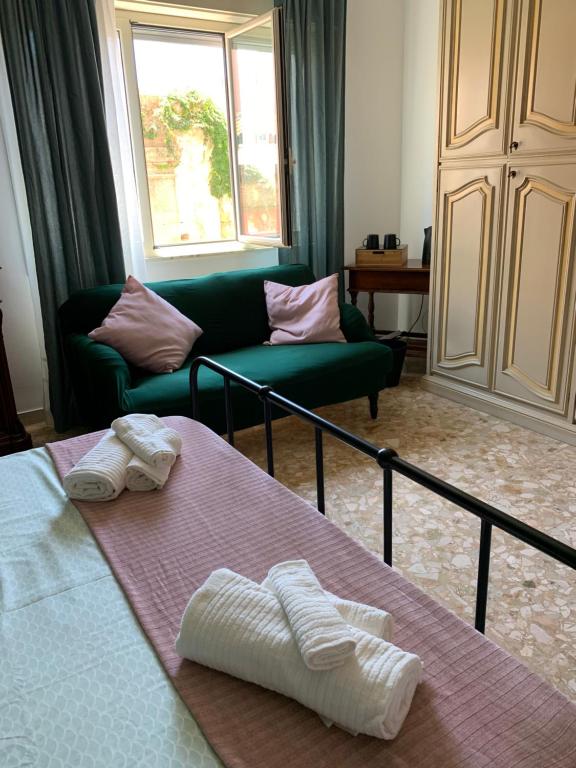 Postel nebo postele na pokoji v ubytování B&B Fiorisol