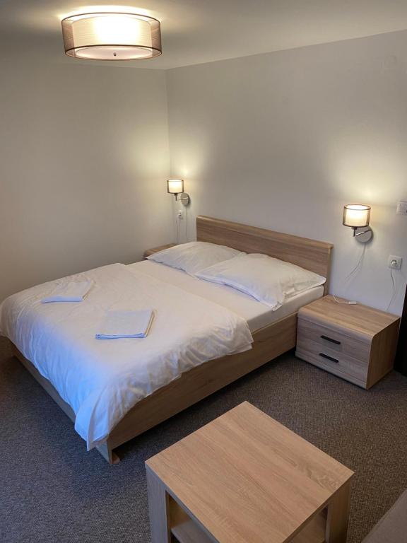 Postel nebo postele na pokoji v ubytování Pension Clara