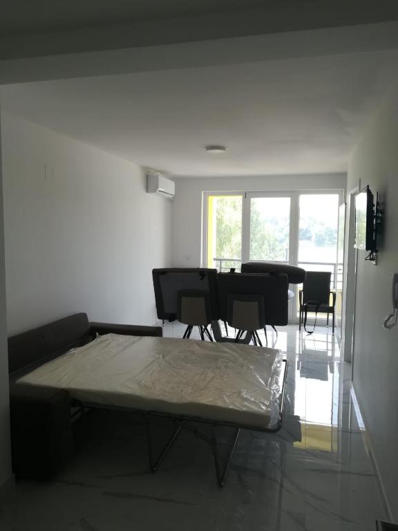 TV a/nebo společenská místnost v ubytování Venezia Apartman