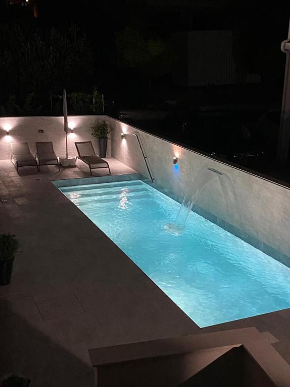 Bazén v ubytovaní Apartment Villa Rina- Heated salt water Pool alebo v jeho blízkosti