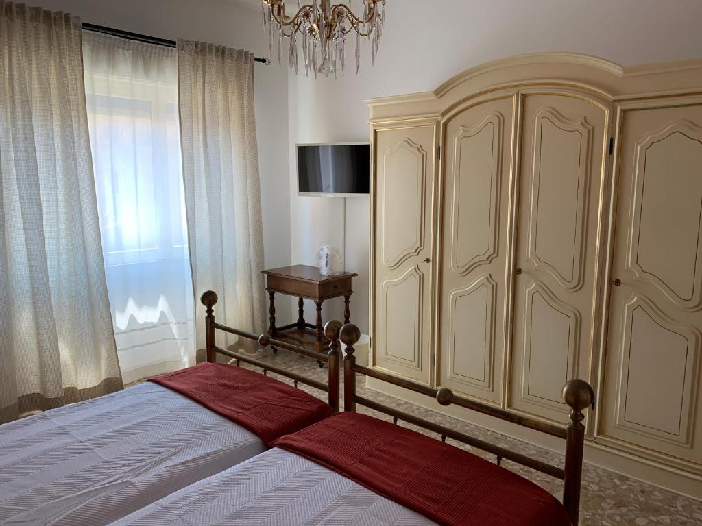 Postel nebo postele na pokoji v ubytování B&B Fiorisol