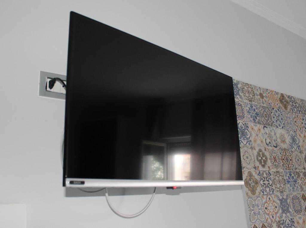 TV a/nebo společenská místnost v ubytování Thalasso Rooms B&B
