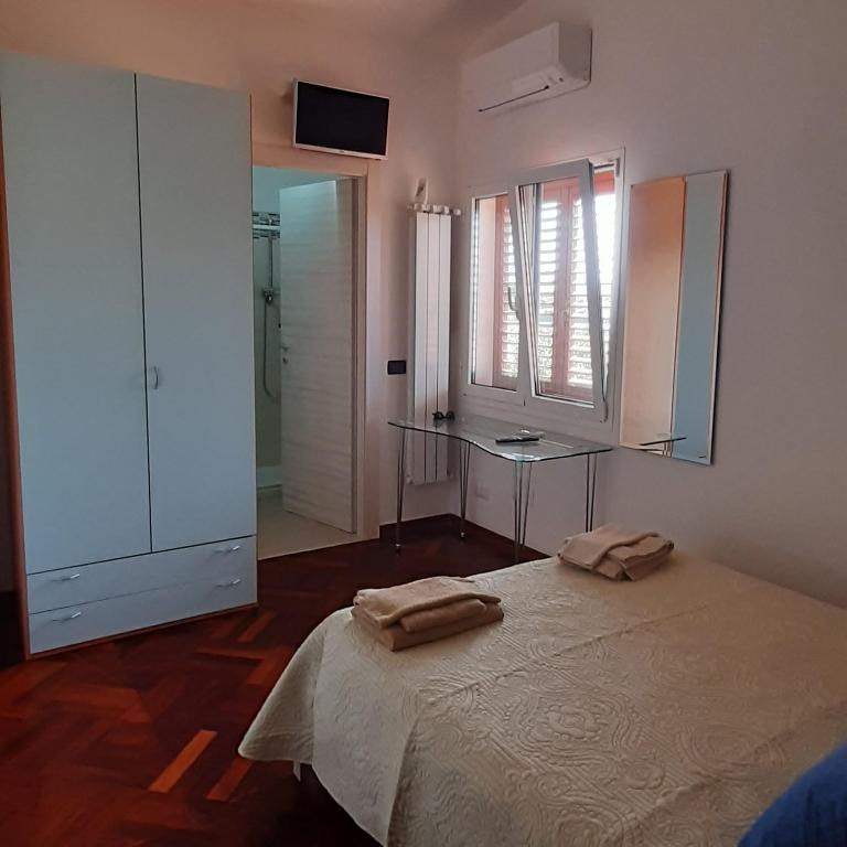 Postel nebo postele na pokoji v ubytování B&B Casa Viola