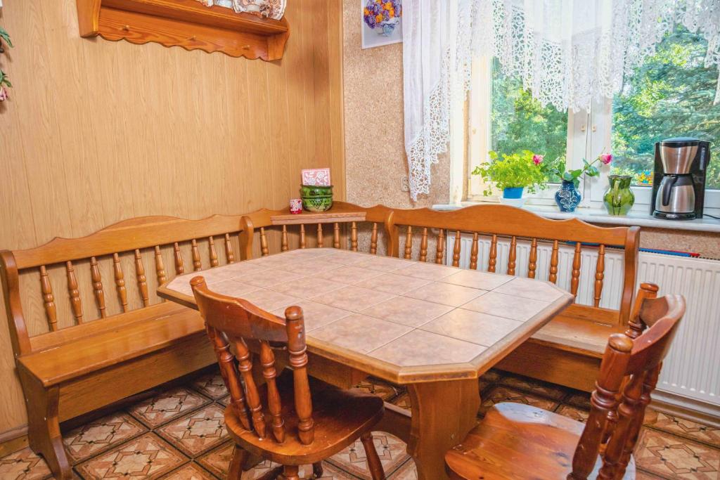 Fotografie z fotogalerie ubytování Mira - Mira pokoje z widokiem na jezioro v destinaci Chmielno